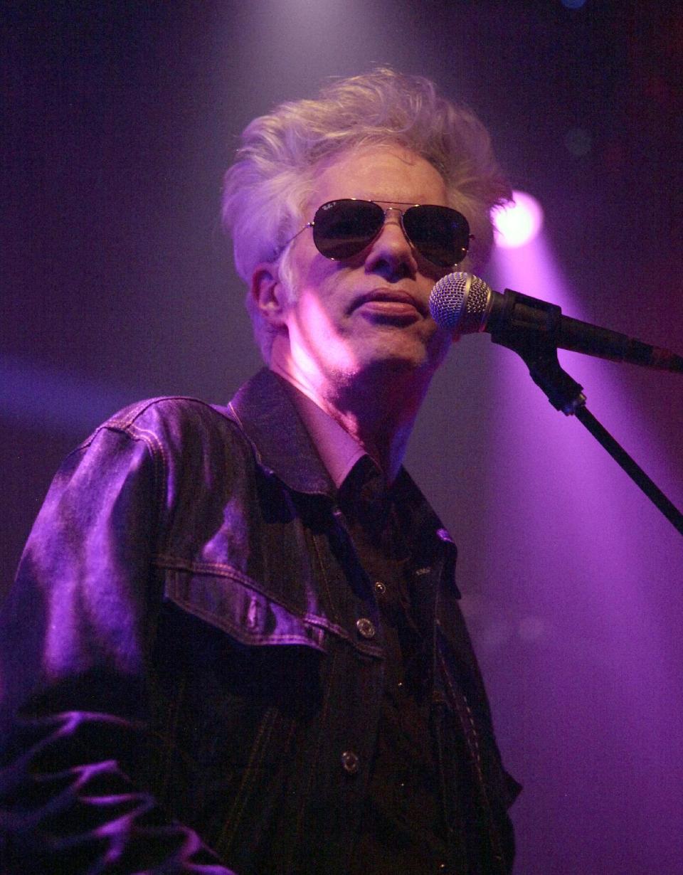 FILE - This April 1, 2014 file photo shows director Jim Jarmusch performing with the band Squrl at the "Only Lovers Left Alive" concert event in New York. Jarmusch’s latest film, “Only Lovers Left Alive,” is a deadpan tale of the undead. Tilda Swinton and Tom Hiddleston star as chic, long-living vampires who, though deeply in love, are currently living separately. (Photo by Andy Kropa/Invision/AP, File)