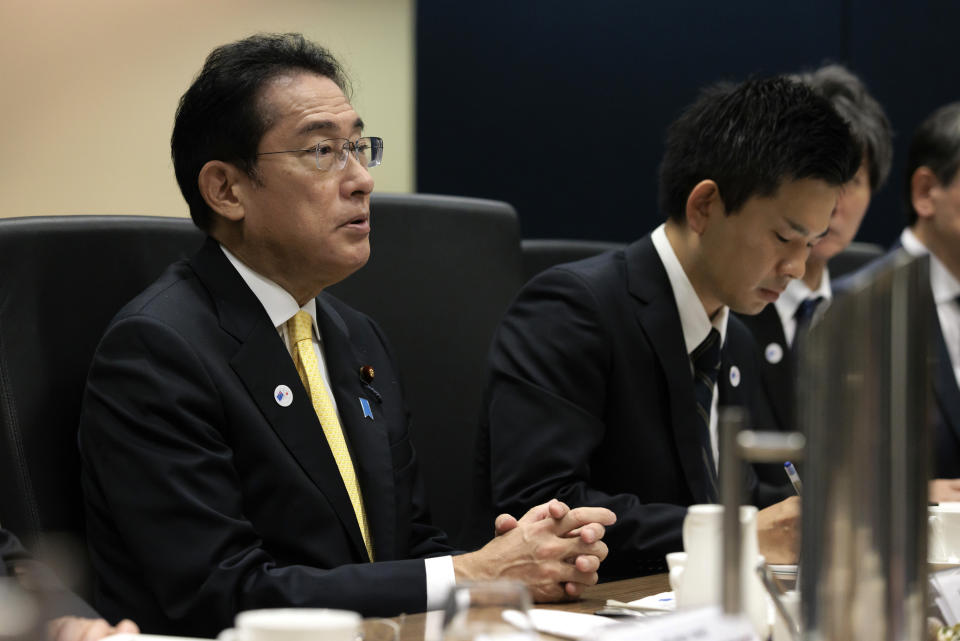 Japan's Prime Minister Fumio Kishida listens to Australian Prime Minister Anthony Albanese in Perth, Australia, Saturday, Oct. 22, 2022. Kishida is on a visit to bolster military and energy cooperation between Australia and Japan amid their shared concerns about China. (Richard Wainwright/Pool Photo via AP)