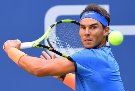 Sept 4, 2016; New York, NY, USA; Rafael Nadal of Spain hits to Lucas Pouille of France (not pictured) on day seven of the 2016 U.S. Open tennis tournament at USTA Billie Jean King National Tennis Center. Mandatory Credit: Robert Deutsch-USA TODAY Sports