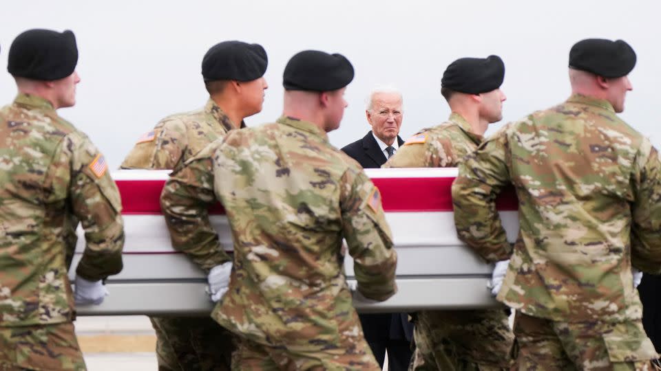 President Joe Biden and Secretary of Defense Lloyd J. Austin III attend the dignified transfer of the remains of Army Reserve Sergeants William Rivers, Kennedy Sanders and Breonna Moffett at Dover Air Force Base in Dover, Delaware, on February 2. - Joshua Roberts/Reuters