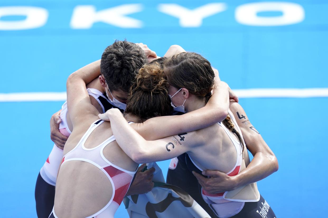 The British team celebrate their mixed relay gold (Danny Lawson/PA) (PA Wire)