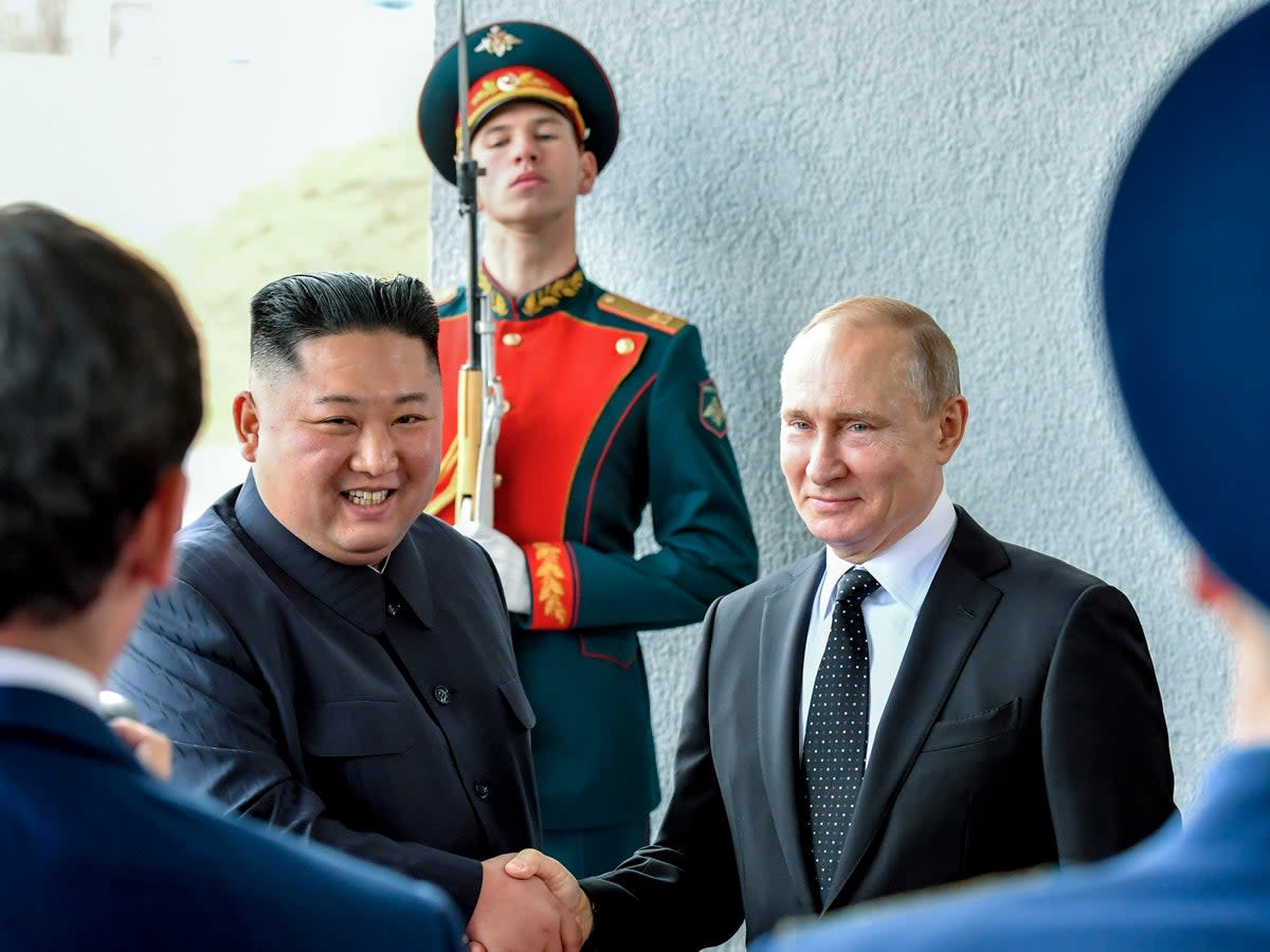 Russian President Vladimir Putin, and North Korea's leader Kim Jong-un shake hands during their meeting in Vladivostok, Russia in 2019  (AP)