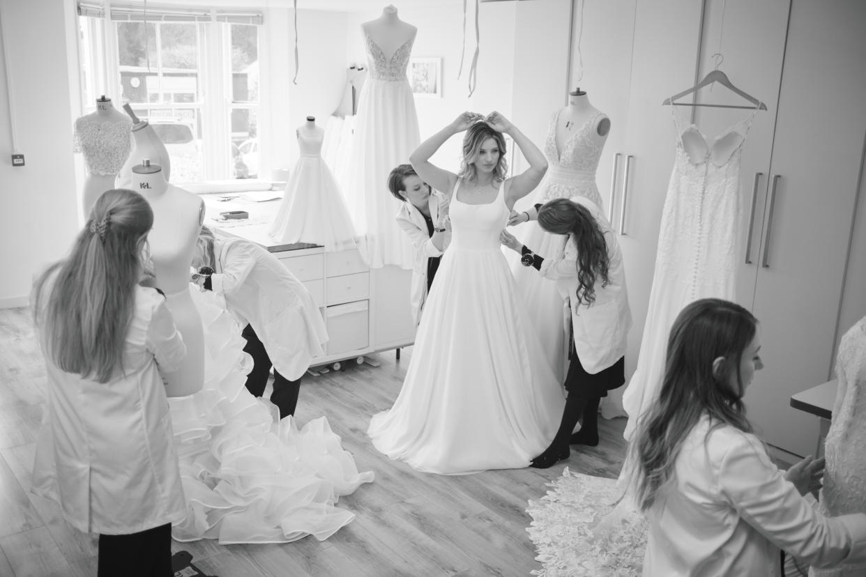 The British-based company has 11 seamstresses who attend to 700 brides annually. Photo: The Modiste