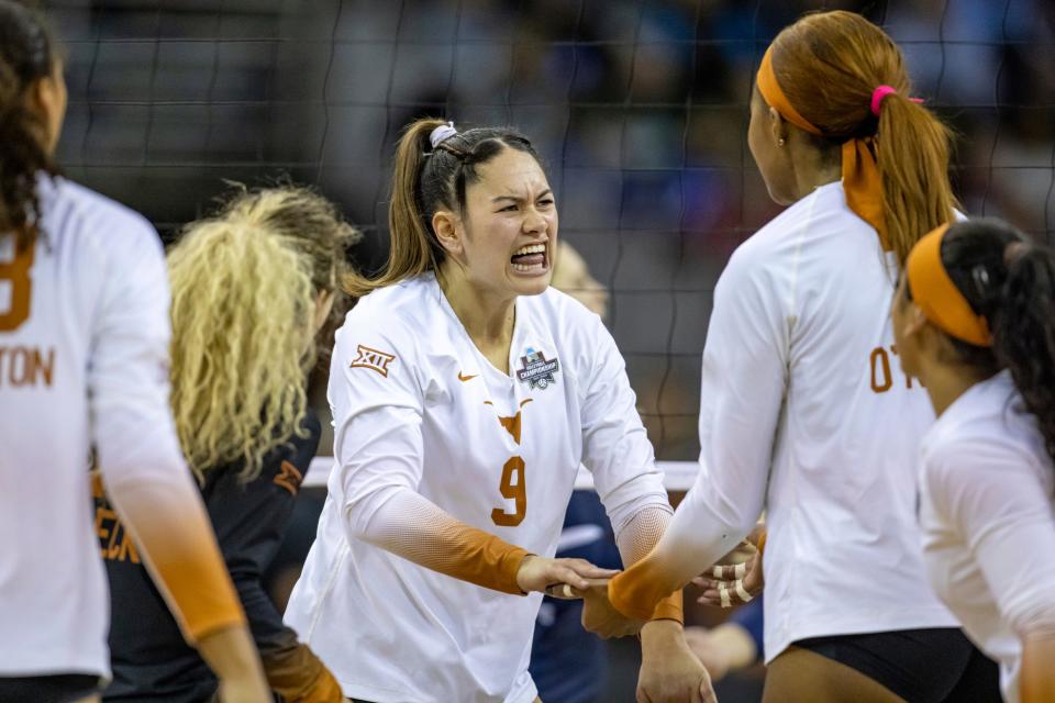 Texas' Saige Ka'aha'aina-Torres celebrates a point in the second set against San Diego.