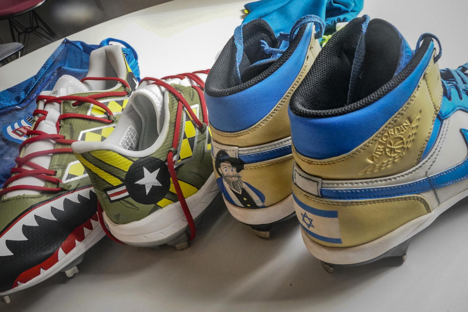 Custom cleats are shown Wednesday, March 1, 2023, in New York. Many players in this year's World Baseball Classic—where Alex Katz is a pitcher on Israel's team, will be wearing custom-designed cleats produced by his company Stadium Custom Kicks. (AP Photo/Bebeto Matthews)