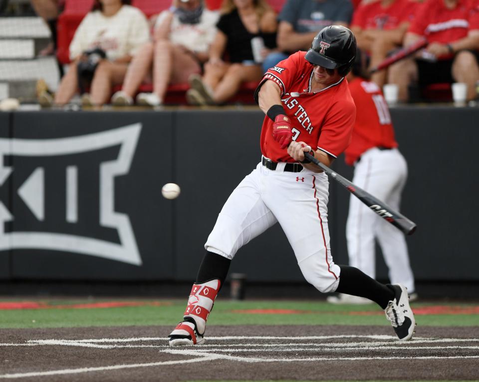 Texas Tech's Jace Jung (2) hits the ball against the Oklahoma, Friday, May 20, 2022, at Dan Law Field at Rip Griffin Park. 