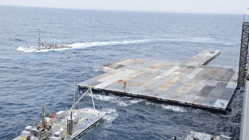 The floating pier off the Gaza coast is part of the Army's Joint Logistics Over the Shore, or JLOTS, system which provides critical bridging and water access capabilities. (U.S. Army via AP)