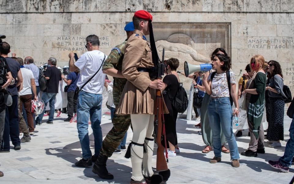 Greek teachers protest against government plans to allow remote teaching with use of a camera - AP Photo/Petros Giannakouris