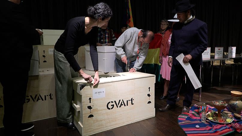 Wide shot boxes of Geneva Ethnographic Museum (MEG) containing three mummified human bodies from the pre-Columbian period ready to be returned to Bolivian autorities