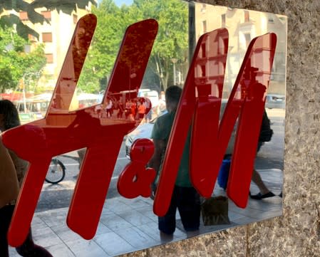 FILE PHOTO: An H&M sign is seen at the entrance to an H&M store in Palma on the island of Mallorca