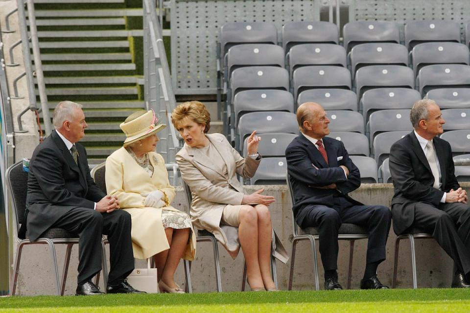 Former GAA President Christy Cooney, then President of the Irish Republic Mary McAleese, Queen Elizabeth II, the Duke of Edinburgh and Dr Martin McAleese watch a video about Gaelic football at Croke Park (Julien Behal/PA Wire) (PA Archive)