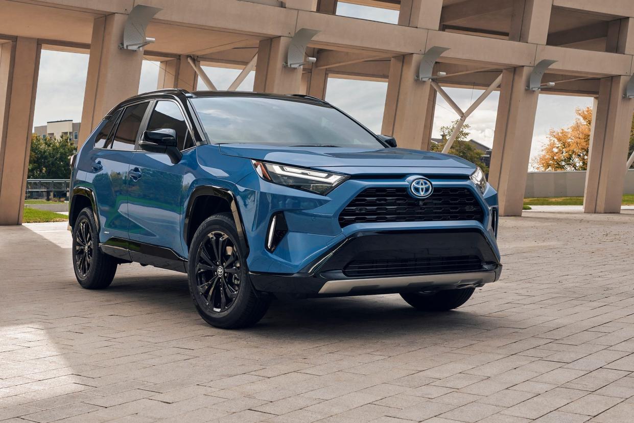 A blue 2024 Toyota RAV4 Hybrid in XSE trim.