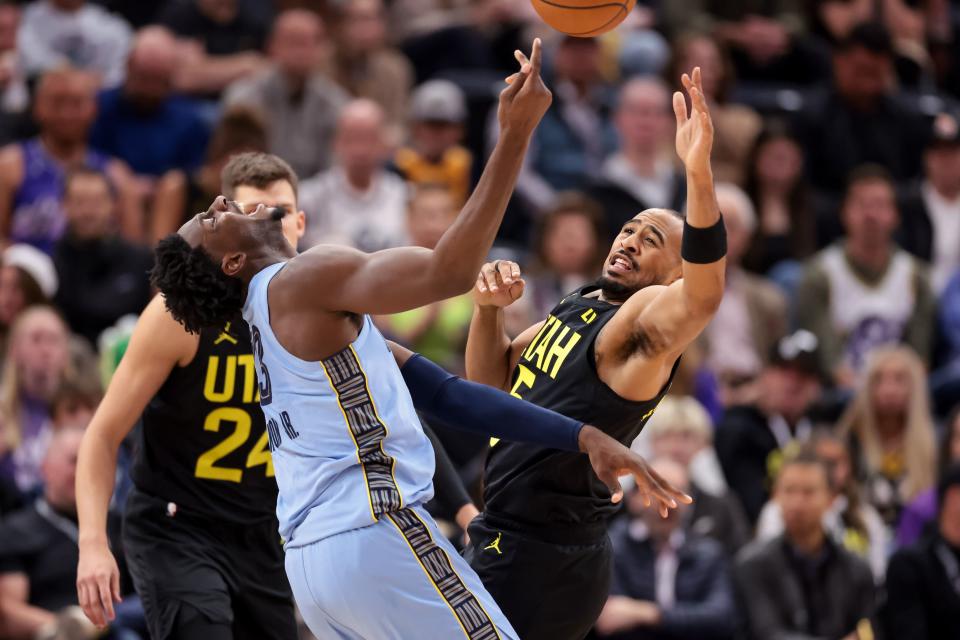 Utah Jazz guard Talen Horton-Tucker (5) is charged with a foul against Memphis Grizzlies forward <a class="link " href="https://sports.yahoo.com/nba/players/6015" data-i13n="sec:content-canvas;subsec:anchor_text;elm:context_link" data-ylk="slk:Jaren Jackson Jr.;sec:content-canvas;subsec:anchor_text;elm:context_link;itc:0">Jaren Jackson Jr.</a> (13) during the game at the Delta Center in Salt Lake City on Wednesday, Nov. 1, 2023. | Spenser Heaps, Deseret News