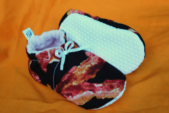 It's never to early to start teaching your children the importance of bacon in our culture.  <a href="http://www.etsy.com/listing/107456597/6-12-months-bacon-slippers?ref=sr_gallery_12&ga_search_query=bacon&ga_view_type=gallery&ga_ship_to=US&ga_page=54&ga_search_type=all">Etsy</a>, <strong>$11</strong>