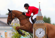 LONDON, ENGLAND - AUGUST 05: Eric Lamaze of Canada riding Derly Chin De Muze competes in the 2nd Qualifier of Individual Jumping on Day 9 of the London 2012 Olympic Games at Greenwich Park on August 5, 2012 in London, England. (Photo by Alex Livesey/Getty Images)