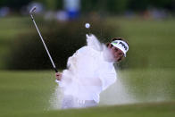 Bubba Watson hits out of a bunker onto the 18th green during the second round of the Zurich Classic golf tournament at TPC Louisiana in Avondale, La., Friday, April 27, 2012. (AP Photo/Gerald Herbert)