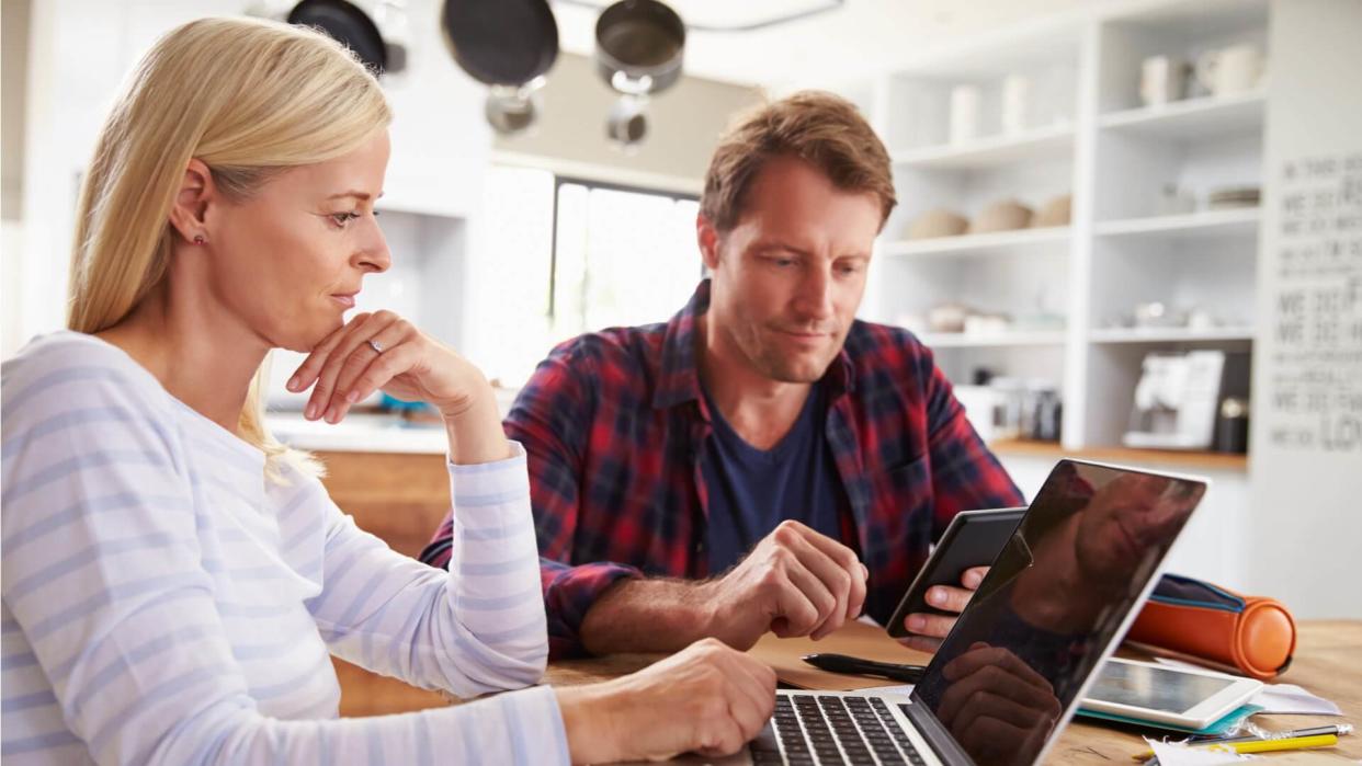 couple doing their finances at home