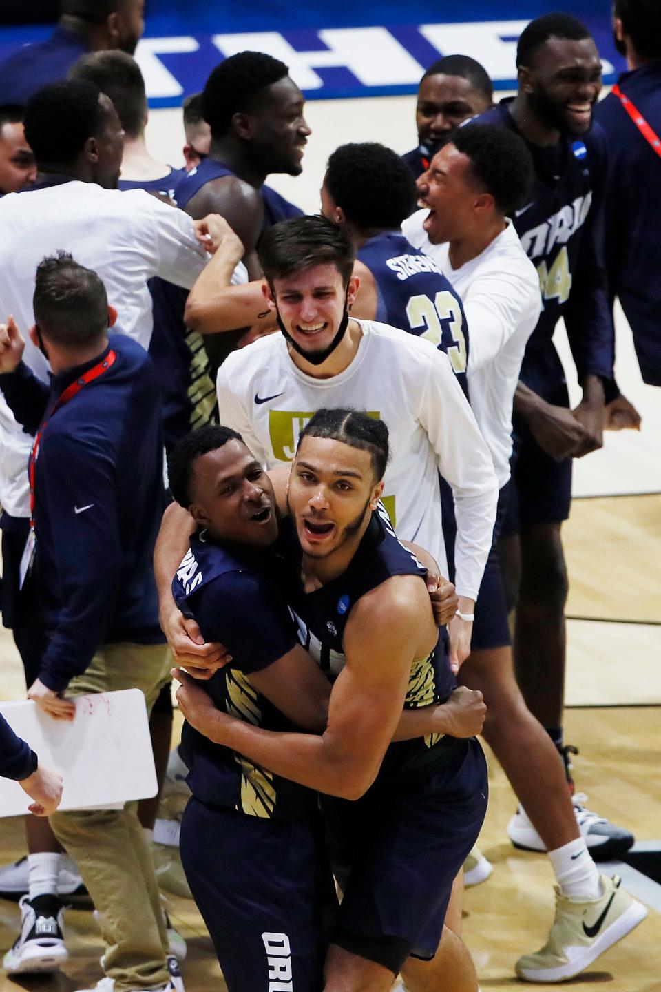 Oral Roberts players celebrate after the upset.