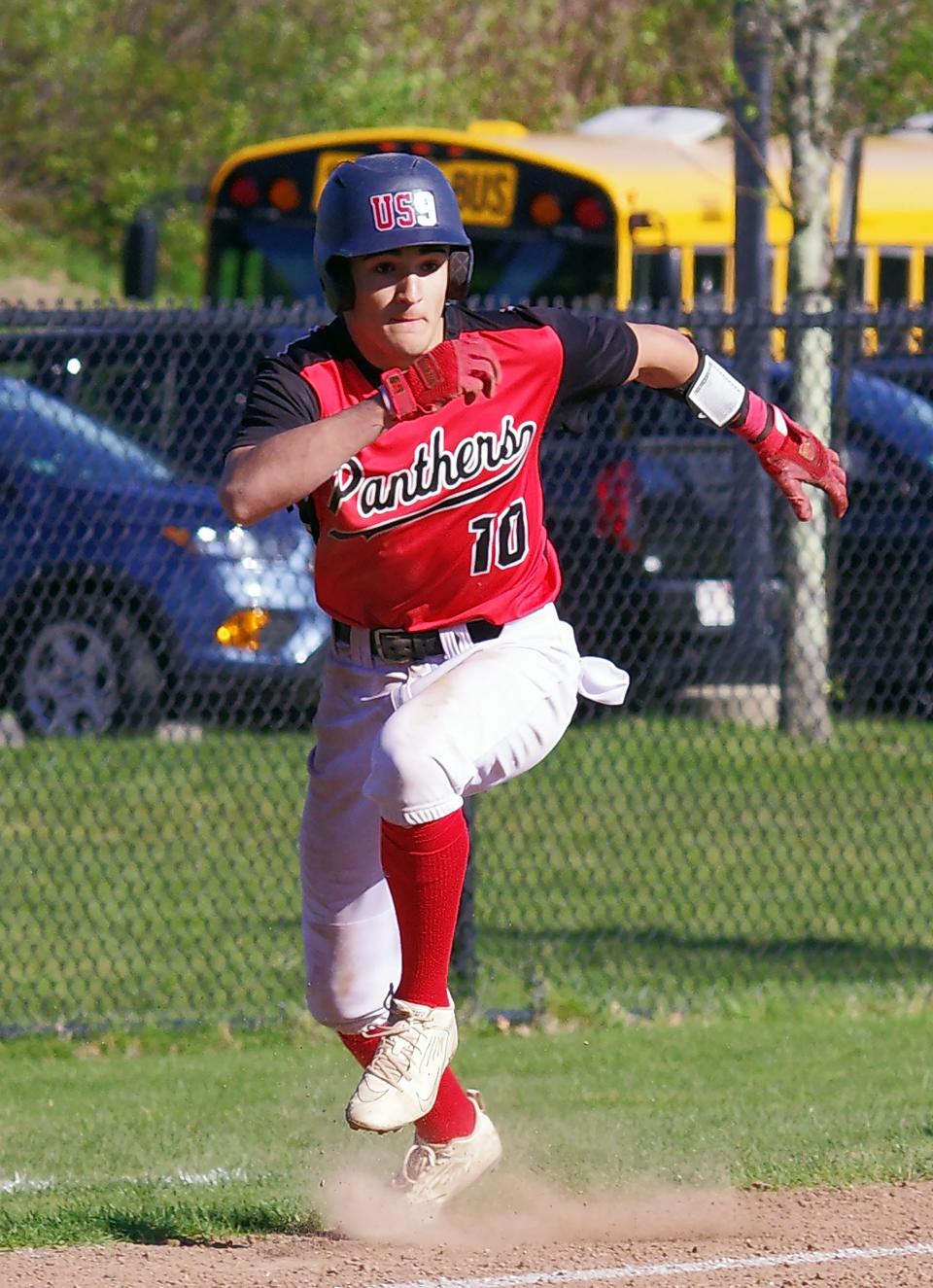 Evan Yakavonis (#10) of Whitman-Hanson takes off for home after a teammate hits the ball into the outfield. Yakavonis would score to bump up an already big lead over North Quincy on Monday, May 1, 2023.