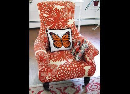 Rosen purchased this classic chair from Anthropologie. The Dahlia print fabric reminds her of work by her favorite textile designer, Josef Frank. The mismatched throw pillows are from eBay and a nearby junk store. 