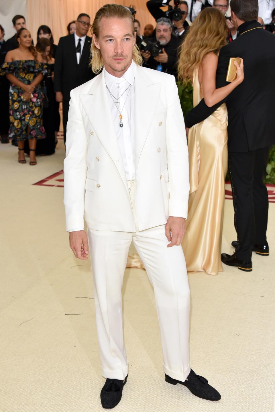 Diplo 
 in Maison Margiela with Christian Louboutin shoes and Mikimoto jewelry