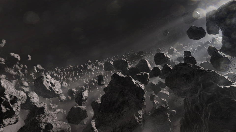 Starring in wonder across a field of asteroids in the depth of space. This is an original 3d render / illustration.