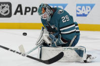 San Jose Sharks goaltender Mackenzie Blackwood defends a shot against the Seattle Kraken during the second period of an NHL hockey game in San Jose, Calif., Monday, April 1, 2024. (AP Photo/Jeff Chiu)