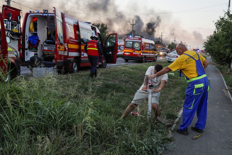Flames rise after an explosion at a LPG station in Crevedia, near Bucharest