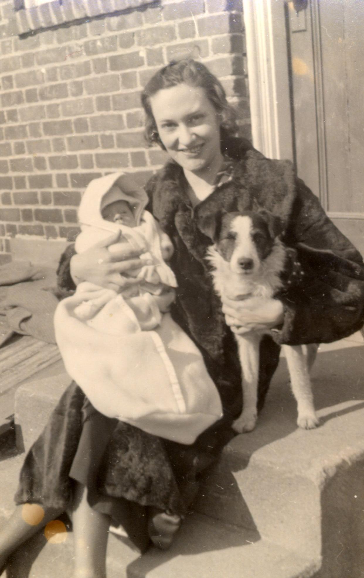 Marie Leonard MacDonald (1912-1989) poses in 1938 at her house on Raleigh Way in Atlantic Heights with son Kenny, 5 1/2 months, and dog Kimmie.