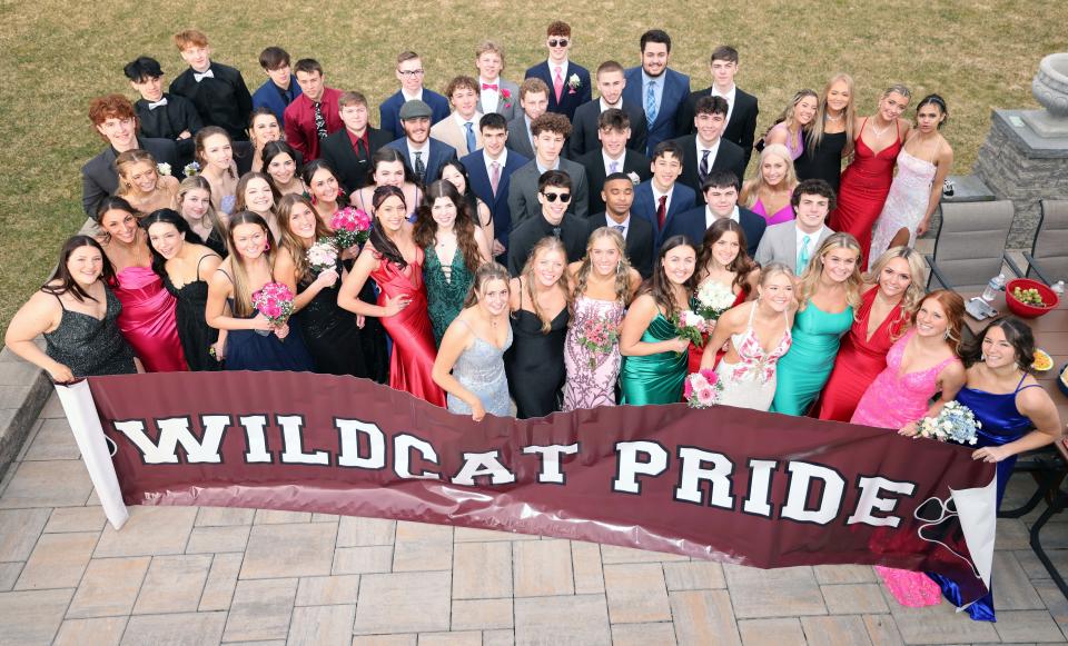 West Bridgewater Middle-Senior High School students attend a pre-prom gathering at a Pearl Road home in West Bridgewater, prior to heading to the senior prom at LeBaron Hills Country Club in Lakeville on Friday, March 24, 2023.