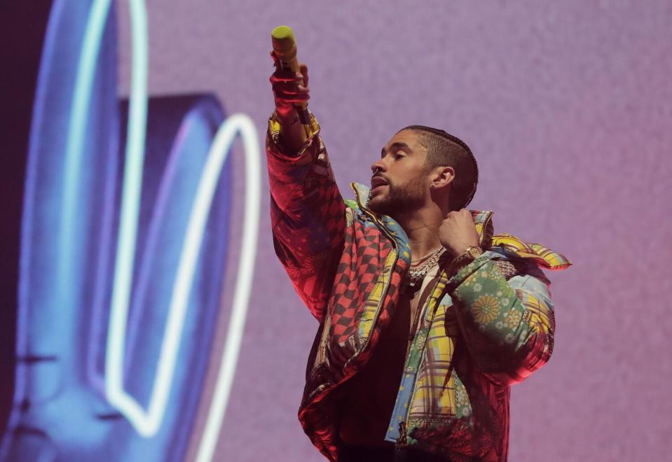 A male singer performs onstage