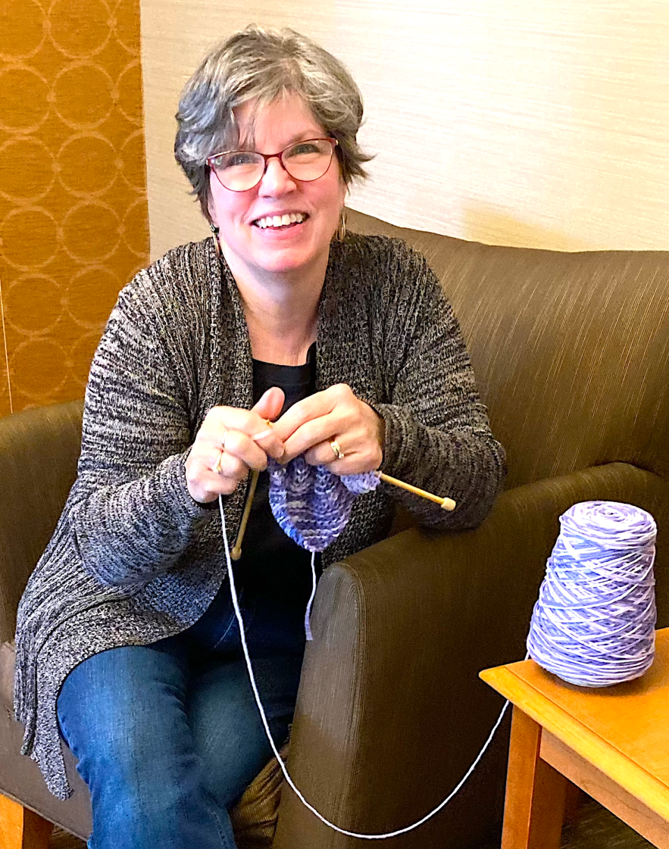 Shannon Stutzman demonstrates some knitting techniques she will be teaching in her class at Holmes Center for the Arts.