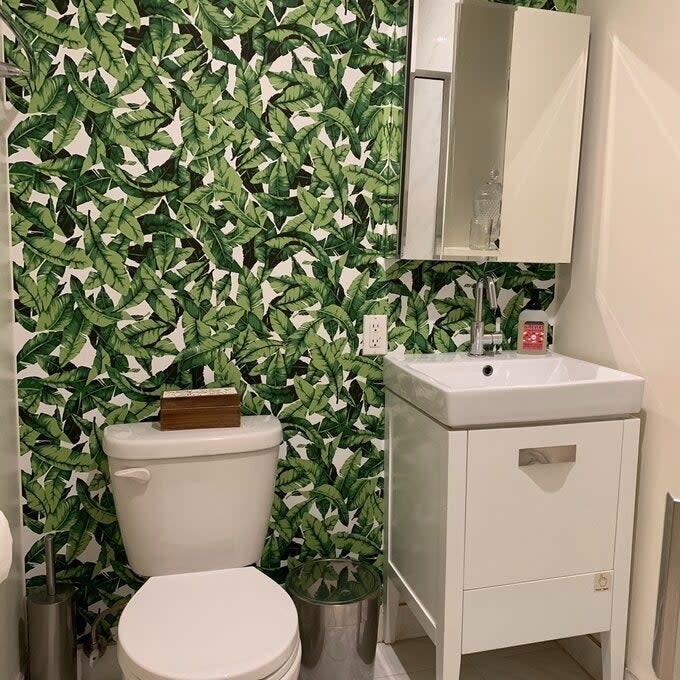 reviewer image of the wallpaper in their bathroom