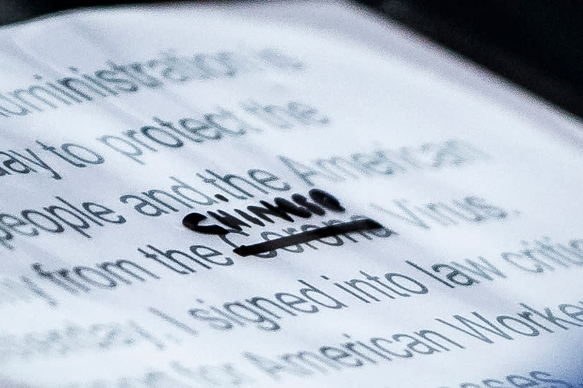 A close up of President Trump's notes shows where Corona was crossed out and replaced with Chinese Virus as he speaks with his coronavirus task force in during a briefing at the White House on March 19, 2020. | Jabin Botsford—The Washington Post/Getty Images
