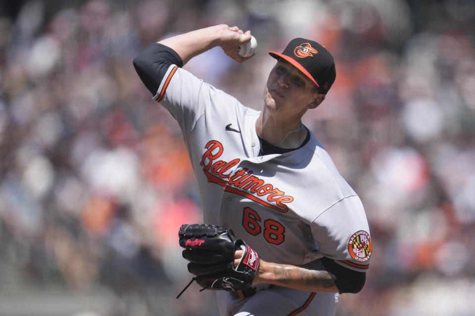 Baltimore Orioles pitcher Tyler Wells works against the San Francisco Giants during the fourth inning of a baseball game in San Francisco, Sunday, June 4, 2023. (AP Photo/Jeff Chiu)