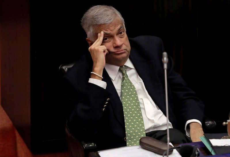 FILE PHOTO: Sri Lanka's ousted PM Wickremesinghe looks on during a parliament session in Colombo