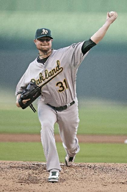 Jon Lester struck out nine Royals hitters. (AP)