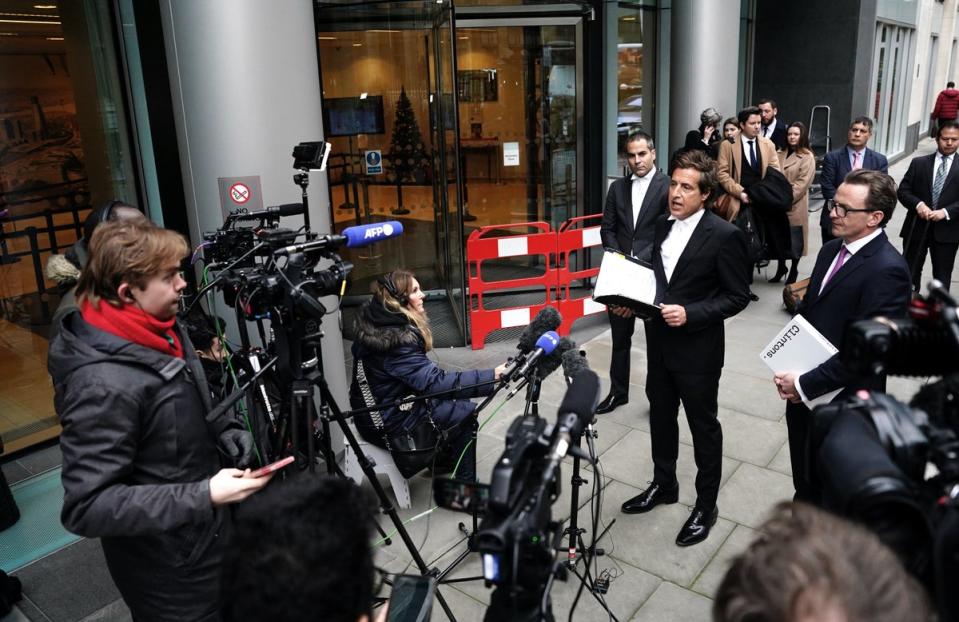 Barrister David Sherborne (centre) reads a statement, on behalf of the Duke of Sussex, outside the Rolls Buildings in central London (PA)
