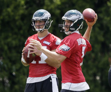 Tim Tebow (L) is in the running for a roster spot.  (AP) 