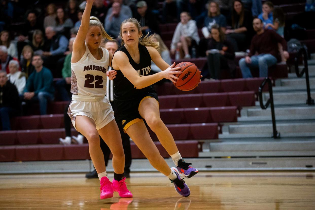 Hamilton's Kaitlyn Geurink drives down the court against Holland Christian Tuesday, Jan. 10, 2023, at Holland Christian. 