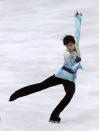 Japan's Yuzuru Hanyu performs during the men's free skating program of the ISU World Team Trophy figure skating competition in Osaka, western Japan, Friday, April 16, 2021. (AP Photo/Hiro Komae)