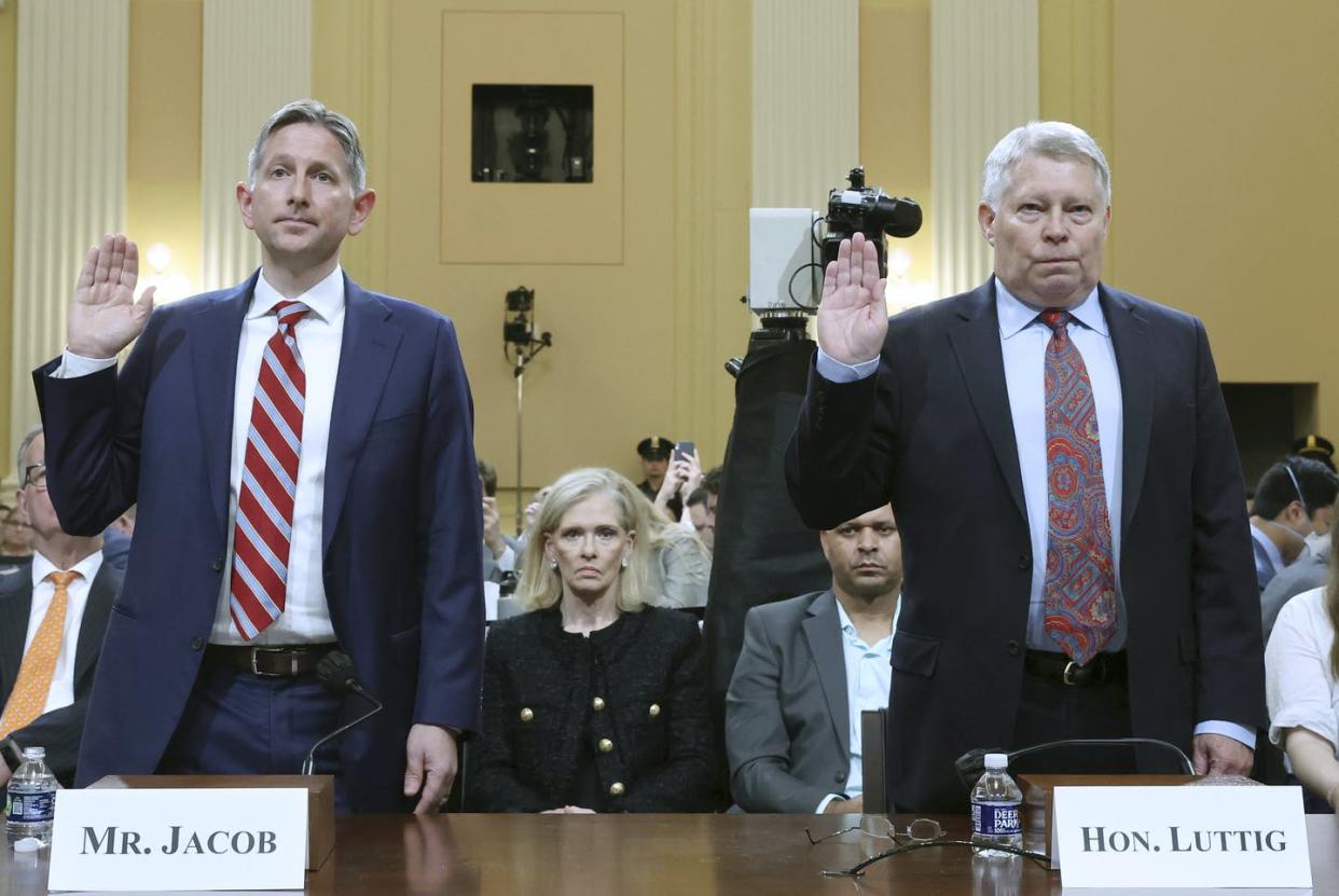 <span class="caption">Greg Jacob, who was counsel to former Vice President Mike Pence, and Michael Luttig, a retired federal judge, testified about the Jan. 6 attack on the Capitol.</span> <span class="attribution"><a class="link " href="https://newsroom.ap.org/detail/CapitolRiotInvestigation/bb96c027abd54abb8096b60c39f79aae/photo" rel="nofollow noopener" target="_blank" data-ylk="slk:Michael Reynolds/Pool Photo via AP;elm:context_link;itc:0;sec:content-canvas">Michael Reynolds/Pool Photo via AP</a></span>