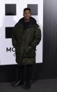 <p>Cool and cosy aren't mutually exclusive things. Not according to Boyega in his oversized Moncler quilted coat and all-black everything else.</p>