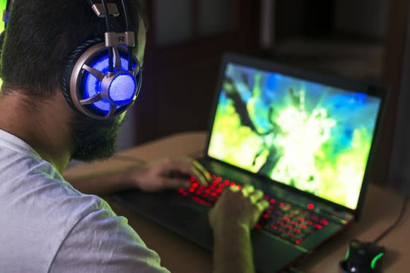 A gamer plays a PC game.