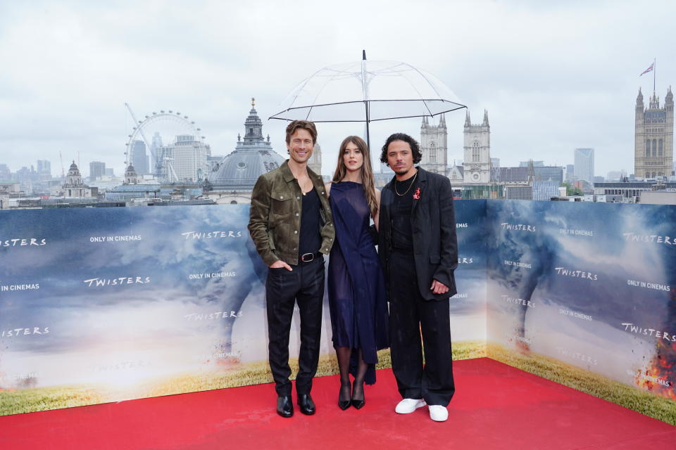 Glen Powell (left), Daisy Edgar-Jones and Anthony Ramos during a photo call for Twisters, at 55 Broadway in central London. Picture date: Tuesday July 9, 2024. (Photo by Ian West/PA Images via Getty Images)