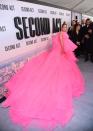 <p>In an enormous Giambattista Valli pink couture tulle gown for the premiere.</p>