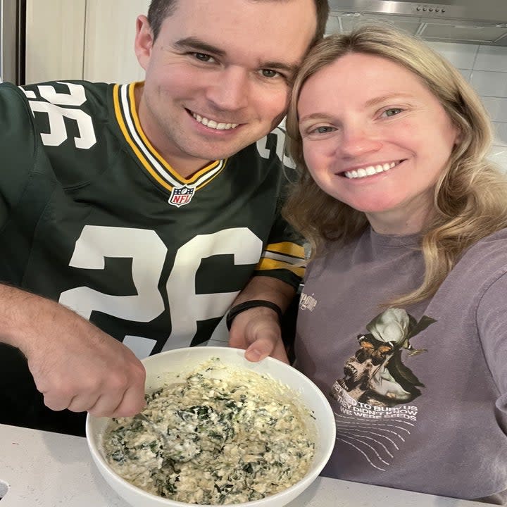 the author and her husband cooking together