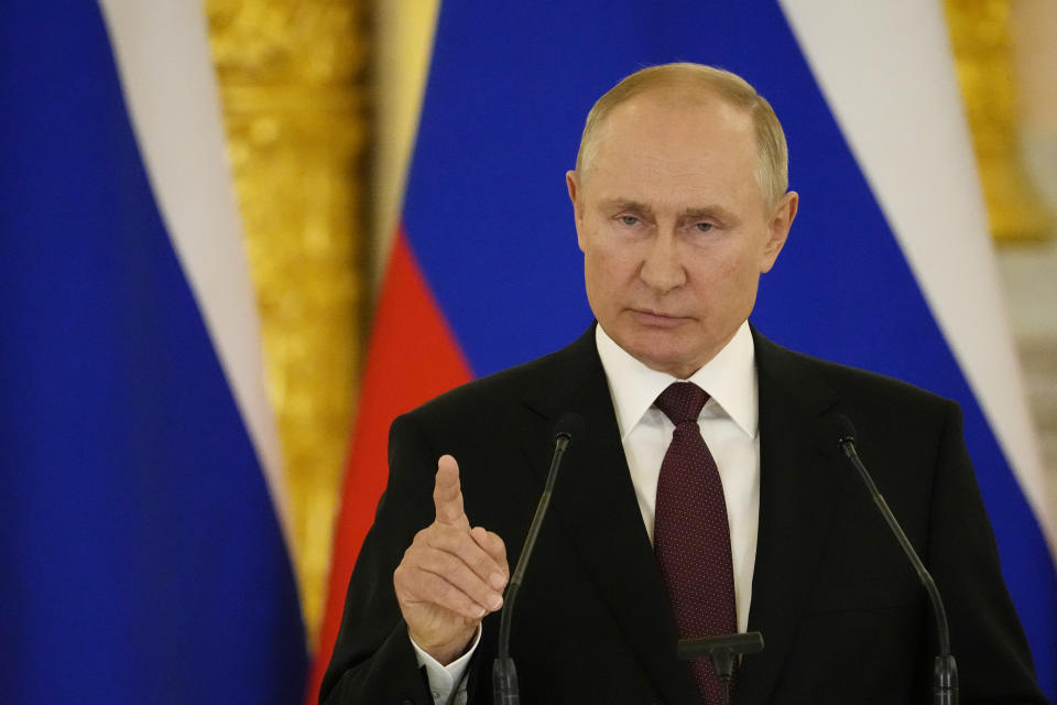 Russian President Vladimir Putin speaks during a joint news conference with German Chancellor Angela Merkel following their talks in the Kremlin in Moscow, Russia, Friday, Aug. 20, 2021. The talks between Merkel and Putin are expected to focus on Afghanistan, the Ukrainian crisis and the situation in Belarus among other issues. (AP Photo/Alexander Zemlianichenko, Pool)