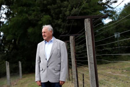 Bella, former border chief poses for a photo at the Pan-European Picnic Memorial Park in Sopronkohida