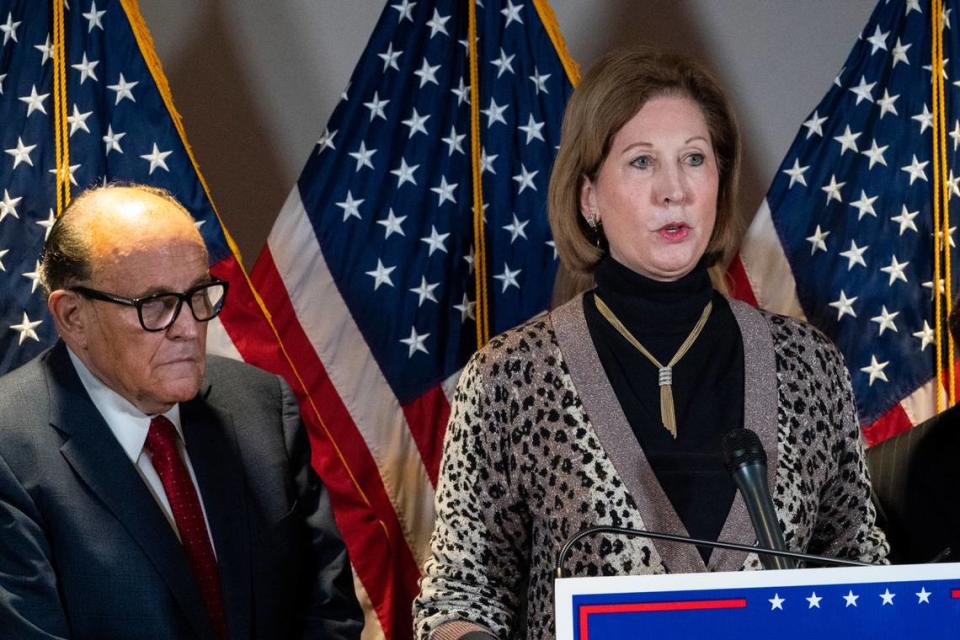 In this Nov. 19, 2020 file photo, Sidney Powell, right, speaks next to former Mayor of New York Rudy Giuliani, as members of President Donald Trump’s legal team, during a news conference at the Republican National Committee headquarters in Washington.